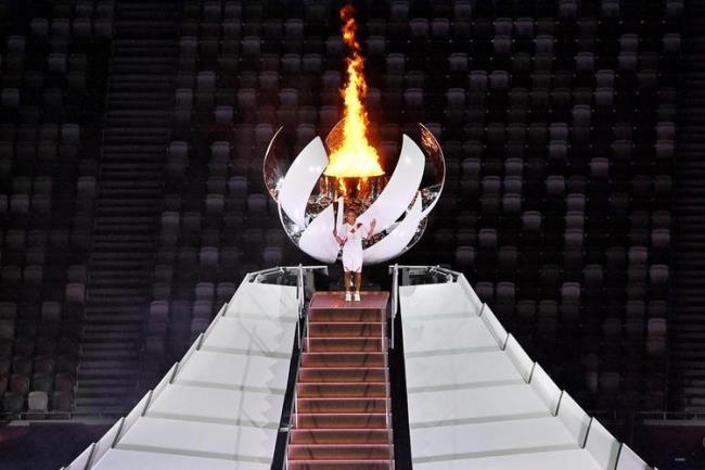 2008奥运会以什么方式点燃圣火